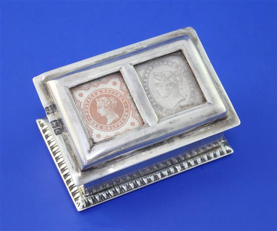 A late Victorian silver twin compartment stamp box by Goldsmiths & Silversmiths Co Ltd, 2.5in.